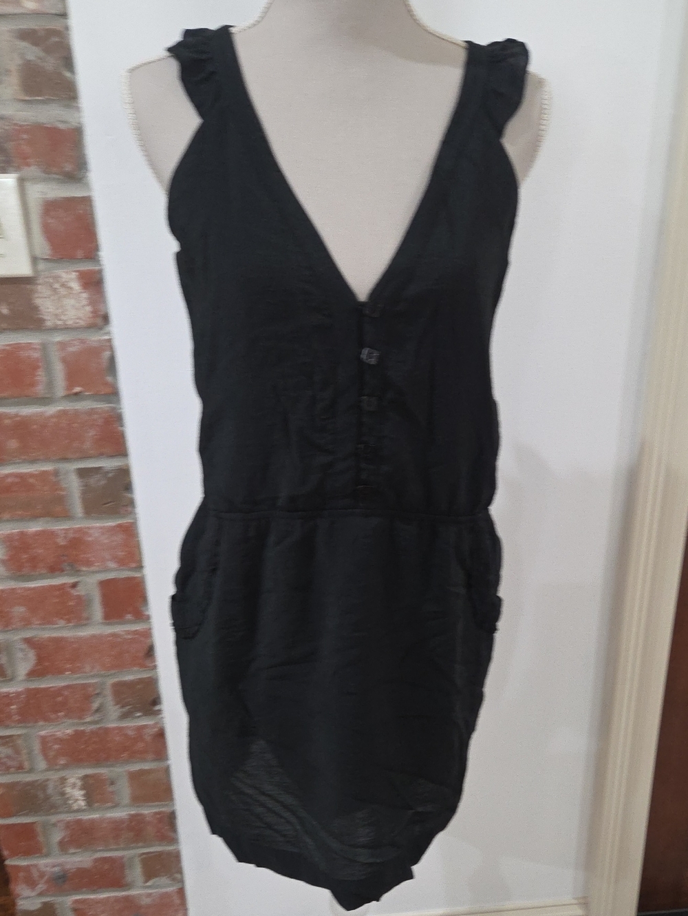 Insight Black Sleeveless V-Neck Button Mini Dress